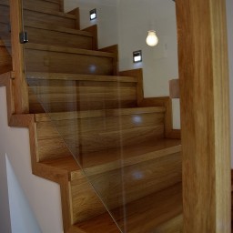 Oak stairs with glass balustrade 